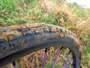 Image of a mud caked Binary tire