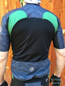 Rear view of Grannygear modeling the assos short sleeve jersey