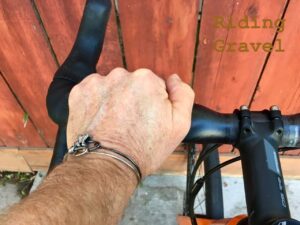 Grannygear's hand on the FSA KWING AGX handle bar