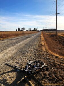 A bicycle and gravel road view