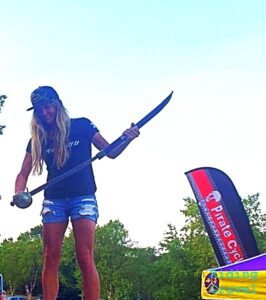 Allison Tetrick with pirate sword after winning the Gravel Worlds event