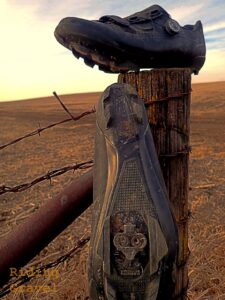 The RX8 gravel shoes on a fence post