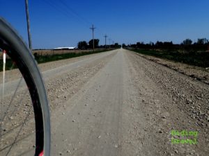 Shot of gravel road and wheel